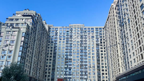 istock Large multi-storey residential building. Panorama. Urban architecture. 2174696969