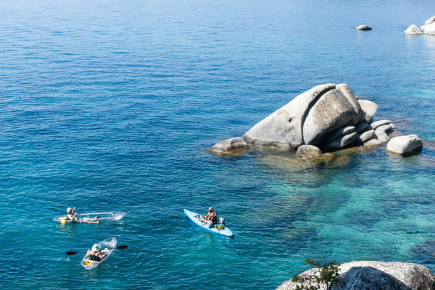 Glenbrook, NV, USA - From a high angle view people can be seen kayaking on Lake Tahoe on a sunny, summer day.