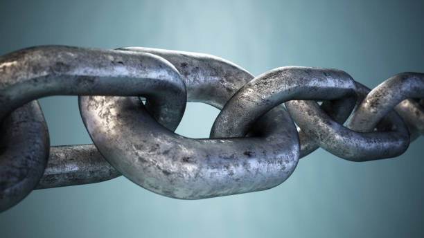 istock Close-up view of a sturdy silver chain link against a soft gradient background highlighting its texture and metallic sheen 2174697329