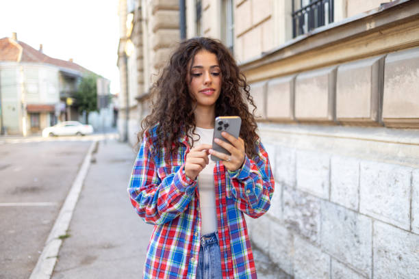 istock A quiet moment of taking selfie in public 2174697496
