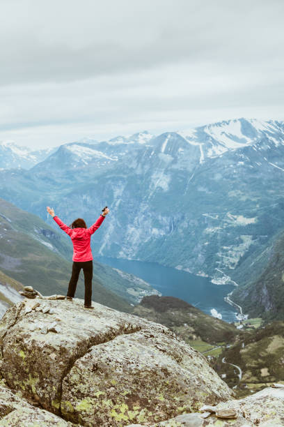 istock Tourist woman on Dalsnibba viewpoint Norway 2174697946