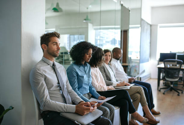 istock Group of diverse people waiting for interviews in an office 2174702214