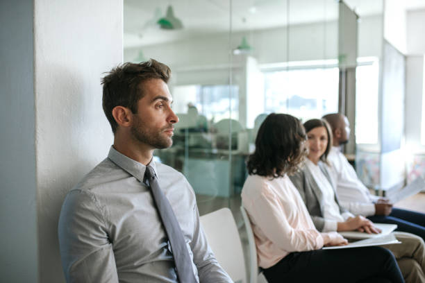 istock Man waiting nervously for his job interview in an office 2174704328