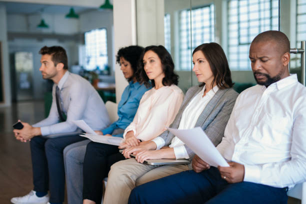 istock Job applicants waiting in an office for their interviews 2174704400