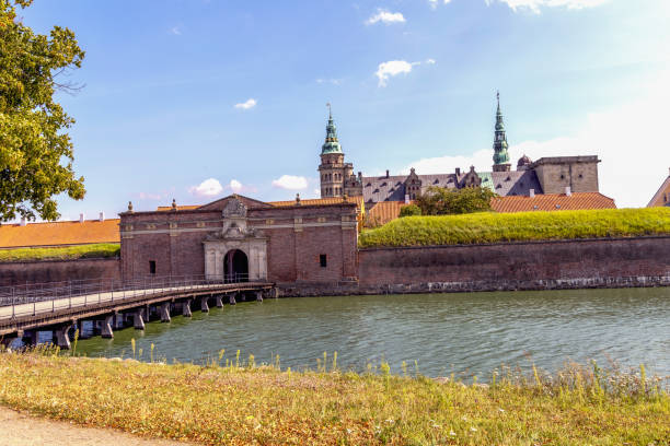 Helsingør / Elsinore, Zealand, Denmark - August 17th 2025:  The iconic Kronborg Castle stands proudly along the waterfront in Helsingør, Denmark. Originally built in the 1420s and later rebuilt in 1629, the fortress is world-famous as the setting for Shakespeare’s Hamlet—even though the playwright himself likely never visited. With its dramatic silhouette and rich history, Kronborg remains one of Northern Europe’s most legendary landmarks.