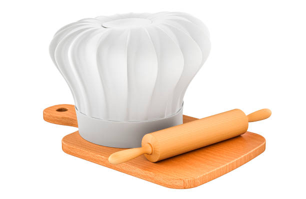 Chef hat with kitchen rolling pin on the wooden cutting board, 3D rendering isolated on white background