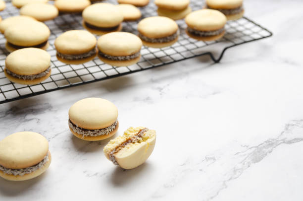 istock The process of cooking cornstarch alfajores. 2174710984