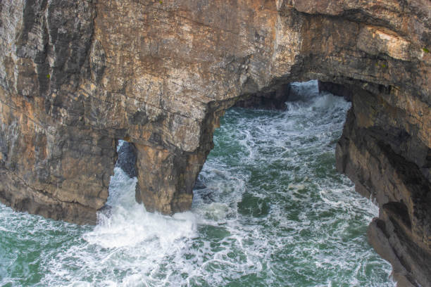 Eroded caves on the Pembrokeshire coastline, Wales, UK