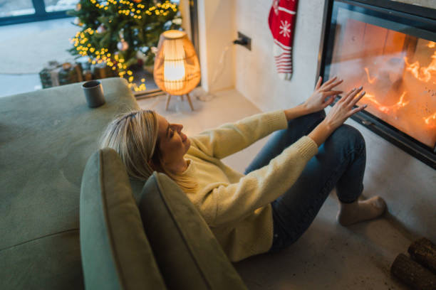 istock Enjoying by the fireplace 2174722258
