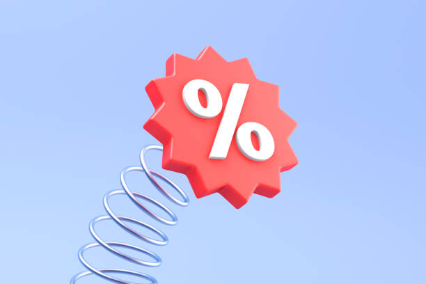 istock Red discount symbol jumping on metal spring 2174741148