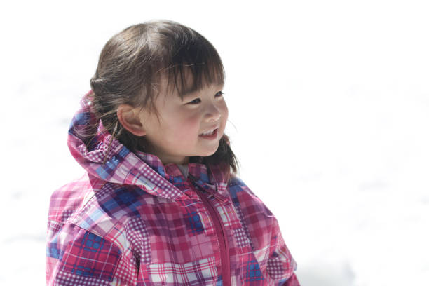 Girl playing in the snow