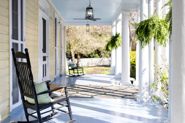 istock Charming Porch With Rocking Chairs And Hanging Plants. 2174751825