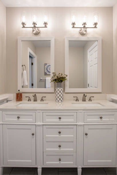 istock Double Sink Vanity With Large Mirrors And Lighting 2174751938