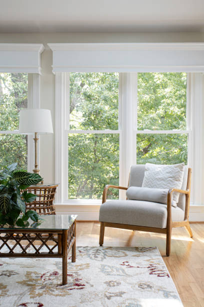istock Cozy Living Room Corner With Large Windows And Plants. 2174751970