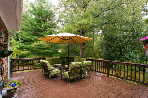 istock Deck Patio With Outdoor Seating And Umbrella 2174752222