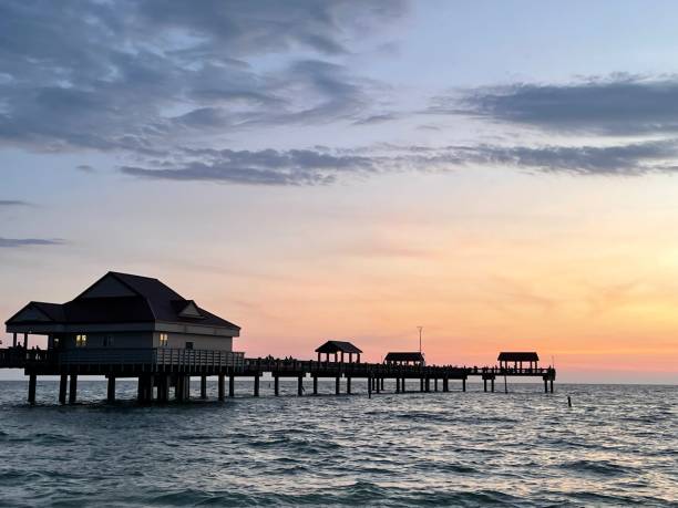 istock The pier in silhouette at twilight 2174753193