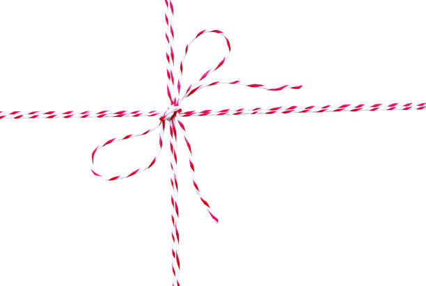 istock String or tied in bow on white background with clipping path. white and red Christmas wrapping ropes tied in bow for gift box. 2174753970