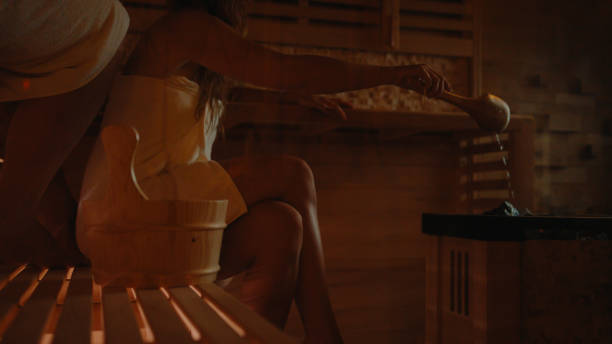 istock Relaxed Caucasian Woman Enjoys Sauna Session 2174755637