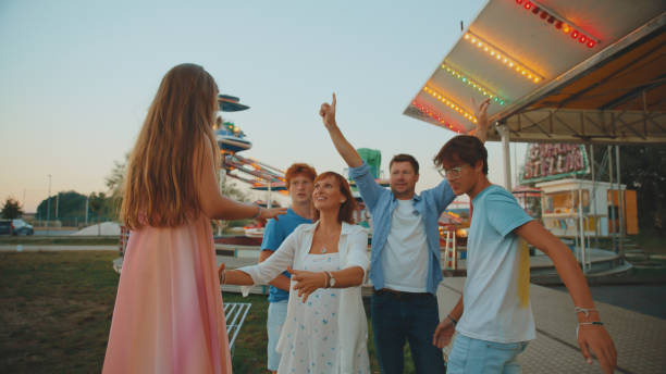 istock Joyful Family Enjoying Amusement Park Outing 2174755731