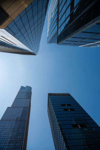 istock Office building in downtown. Skyscraper perspective view. City architecture. Architecture of modern office building. Perspective city skyscraper. Modern skyscraper building. City downtown 2174755765