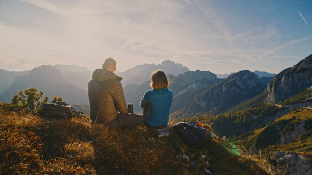 istock Caucasian Hiker Couple Pausing to Admire Mountain Scenery 2174757688