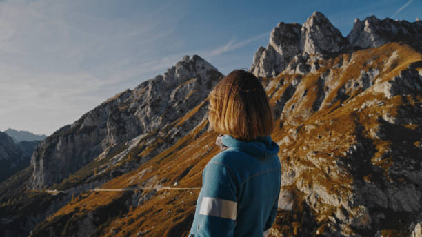 istock Female Hiker in Mountains Relishes Vista 2174757710