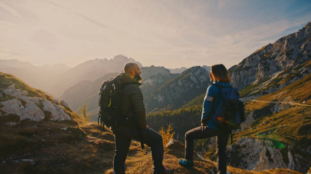 istock Caucasian Hiking Duo Pausing to Admire Mountain Views 2174757725