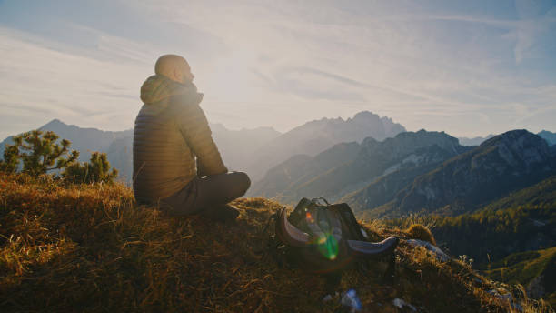 istock Caucasian Hikers Resting with Mountain View 2174757732