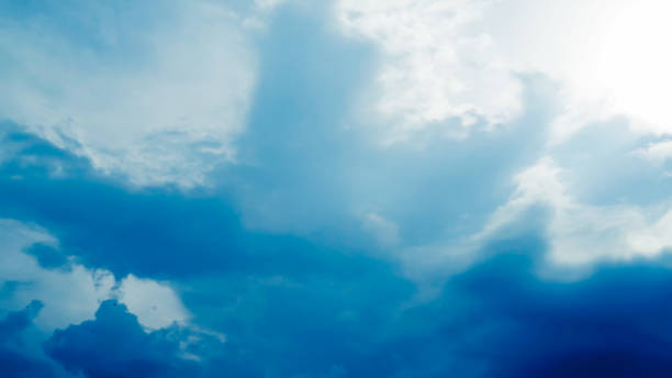 istock clouds and blue sunny sky,  white clouds over blue sky, Aerial view,  nature blue sky white cleat weather. 2174762238