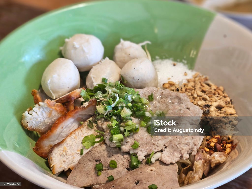 Tom yum dried thin rice noodle with ground meat pork , roasted pork and meatball toping Tom yum dried thin rice noodle with ground meat pork , roasted pork and meatball topping Asian style. Cafe Stock Photo Tom yum dried thin rice noodle with ground meat pork , roasted pork and meatball toping Tom yum dried thin rice noodle with ground meat pork , roasted pork and meatball topping Asian style. Cafe Stock Photo