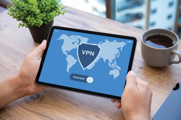 istock male hands hold computer tablet with app vpn on screen 2174774314