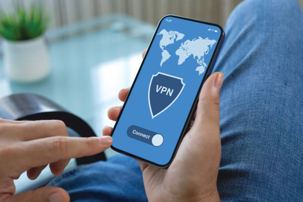istock male hands hold phone with app vpn on screen jeans 2174774323