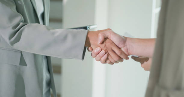 istock Close-Up of Business Handshake Between Two Professionals. 2174783332
