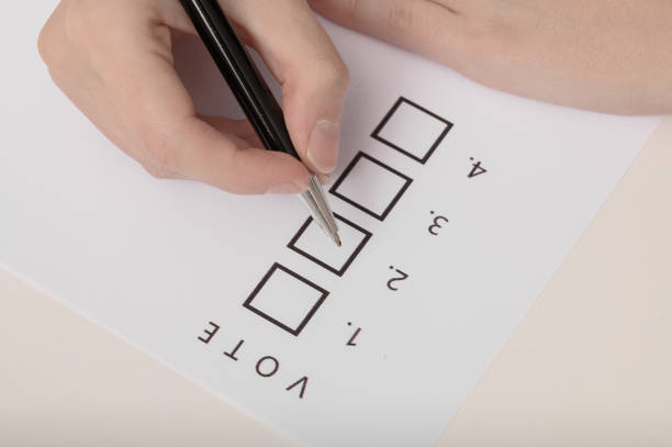 Vote in elections, check the box with a pen