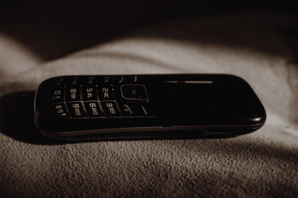 Vintage Old telephone orange background