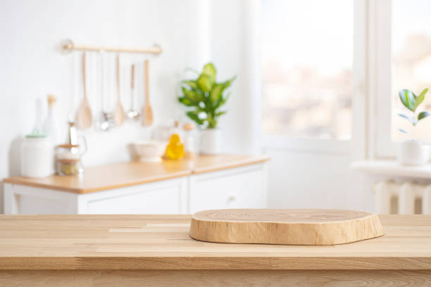 istock Podium or cutting board on wooden table on defocused rustic kitchen bench interior background 2174795333