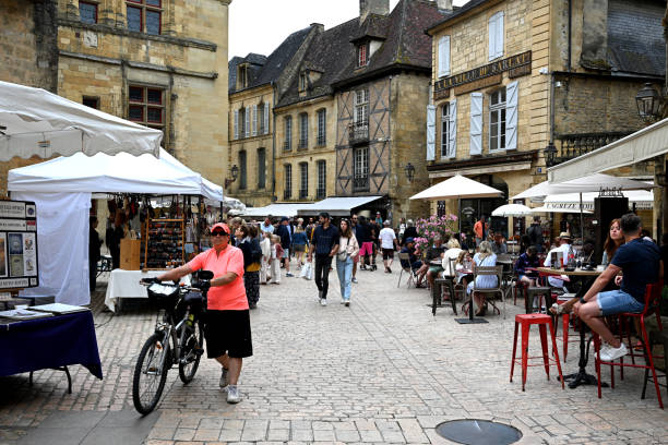 Sarlat, France; 22 July 2024: Place du Peyrou in the medieval old town of Sarlat in the Dordogne