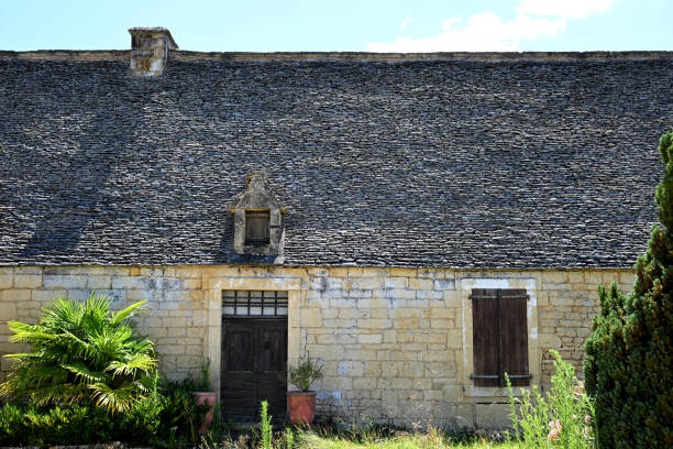 Example of a Thackstone or Lauze roof which is a traditional form of roof tiling as seen in the Perigord Noir