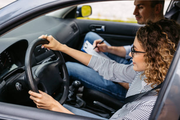 istock Young Woman Taking A Driving Test 2174812267