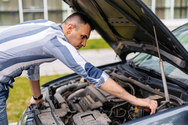 istock Mid-Adult Man Having Car Problems On The Street 2174815382