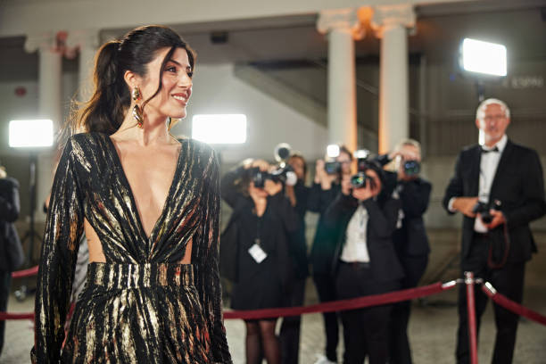 istock Brunette celebrity walking the red carpet 2174816429