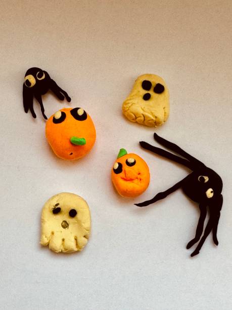 istock plasticine toys for Halloween: spider, ghost, pumpkin 2174822178