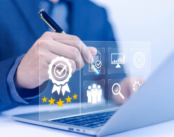 istock Businessman holding quality certification mark, audit, business, assurance, control, digital, service, complete, assessment, checklist, data with quality icon. 2174822617