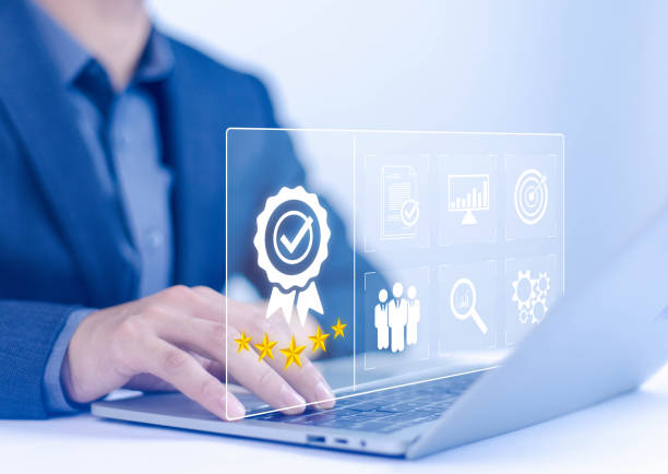 istock Businessman holding quality certification mark, audit, business, assurance, control, digital, service, complete, assessment, checklist, data with quality icon. 2174823135