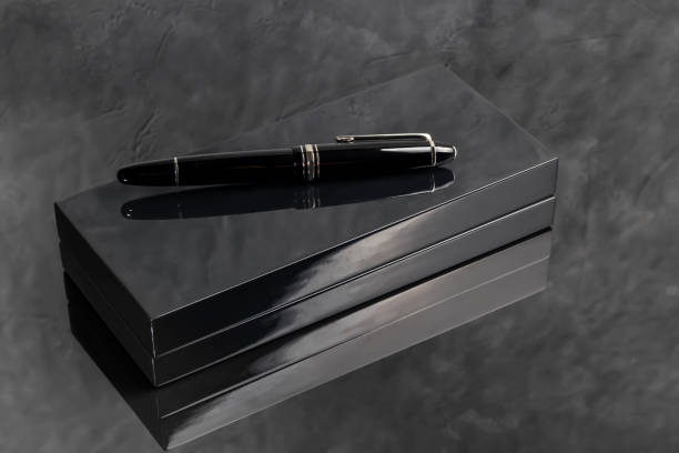 istock Fountain pen on marble and grey background. Selective focus. Office interior Copy space 2174825875