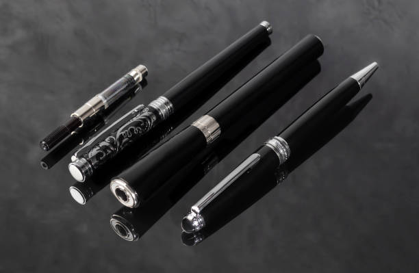 istock Fountain pen on marble and grey background. Selective focus. Office interior Copy space 2174826671
