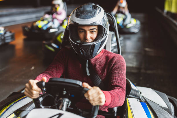 istock Focused Go-Kart Racer in Helmet Ready for Action 2174833083