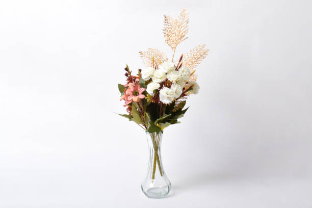 istock Beautiful artificial flower bouquet in glass vase 2174836198