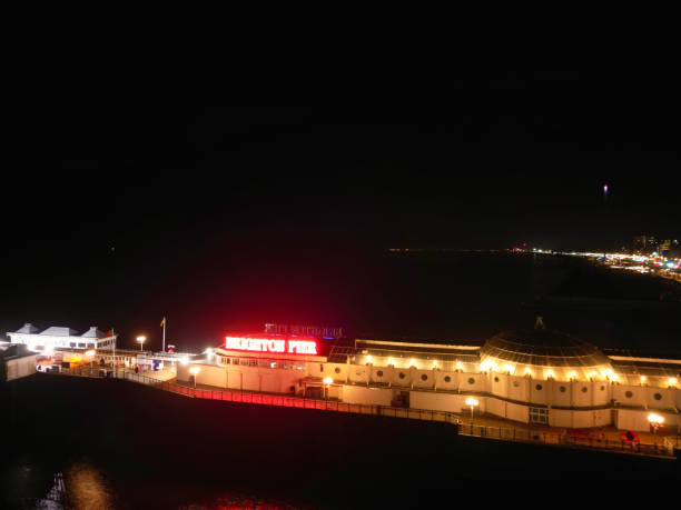 Aerial View of Illuminated Brighton and Hove City of England United Kingdom During Dark Night of May 9th, 2024