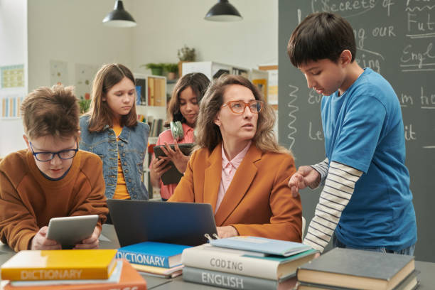 istock Teacher Talking to Children 2174839973